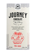 Load image into Gallery viewer, A large size packaged Journey Chocolate bar in an off-white cardboard box with wavy US postal service lines across the top, lower sides and bottom of the box. A white postage stamp style seal with a cacao pod in the middle seals the box, with the words &quot;Experts in small-batch, craft chocolate&quot; in a circle around the image and the words &quot;Seal of Quality&quot; at the bottom. The Journey Chocolate logo is centered on the bar and an Peru 70% dark stamp centered on the bottom, net weight 2.47 oz or 70 grams
