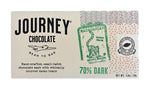 Load image into Gallery viewer, A medium size packaged Journey Chocolate bar in an off-white cardboard box with wavy US postal service lines across the top and right sides of the box. A white postage stamp style seal with a cacao pod in the middle seals the box, with the words &quot;Experts in small-batch, craft chocolate&quot; in a circle around the image and the words &quot;Seal of Quality&quot; at the bottom. The journey chocolate logo is on the left side of the  bar and an Madagascar 70% dark stamp centered in the middle, net weight 1.0 oz or 28 grams.
